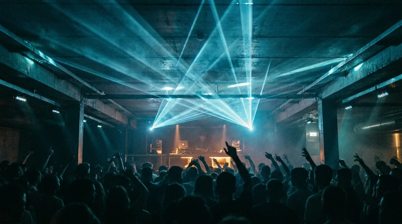 Dark underground club with blue and cyan lighting, progressive house atmosphere